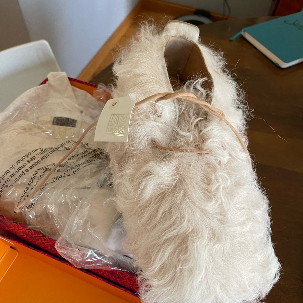A pair of brand new Tory birch Evan booties. Natural color